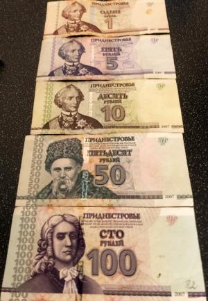 Banknotes aligned vertically.